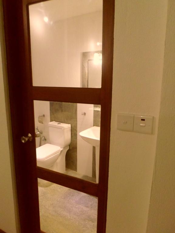 Nilas Guesthouse Hikkaduwa Værelse billede