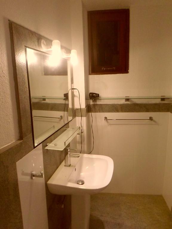 Nilas Guesthouse Hikkaduwa Værelse billede