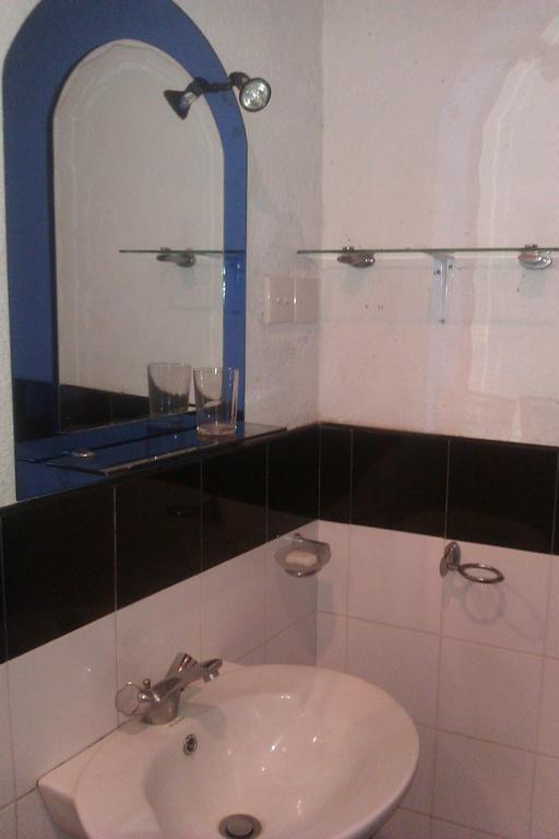 Nilas Guesthouse Hikkaduwa Værelse billede